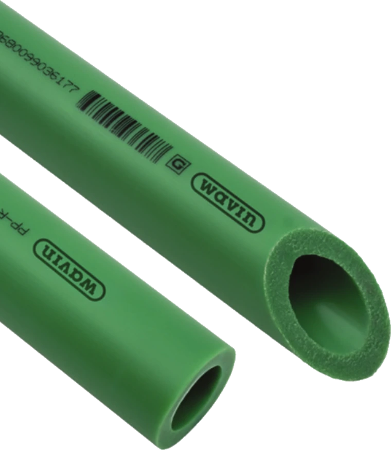A green Wavin PP-R / PP-RCT water-supply pipe from the product guide, its bore and wall visible