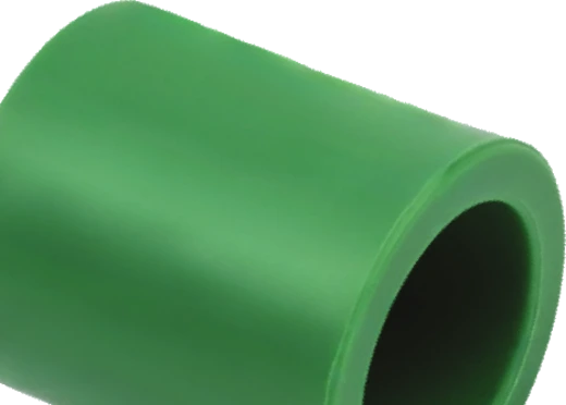 A green Wavin PP-R socket (coupler)